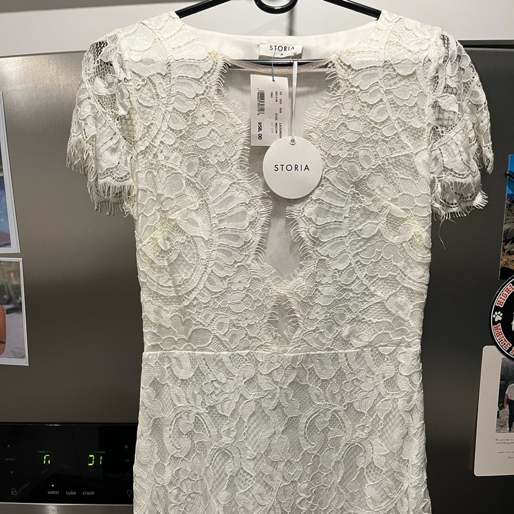 Womens white lace overlay dress. New with tags. Size medium